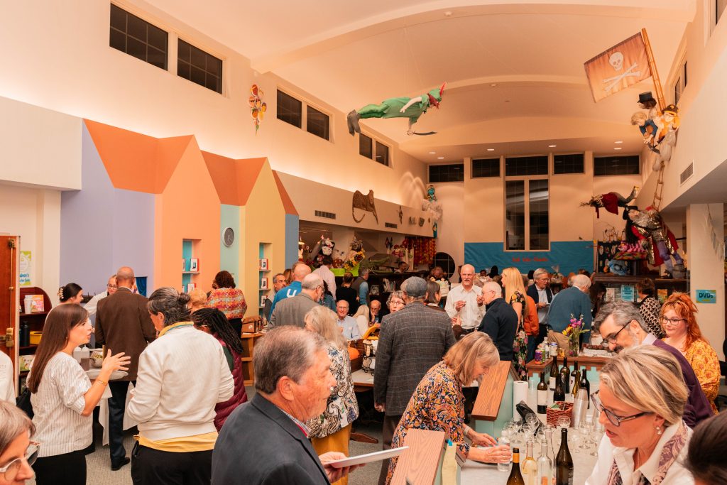 The upstairs Children's Department is filled with guests.